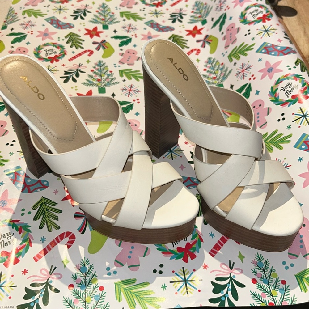 Also platform heels size 8. Only worn once.